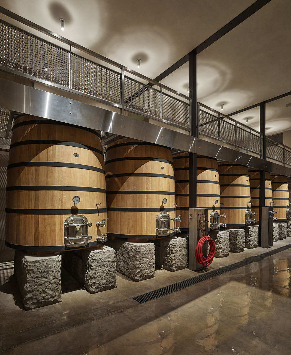 french oak wine barrels in a wine cave from Davis Estates