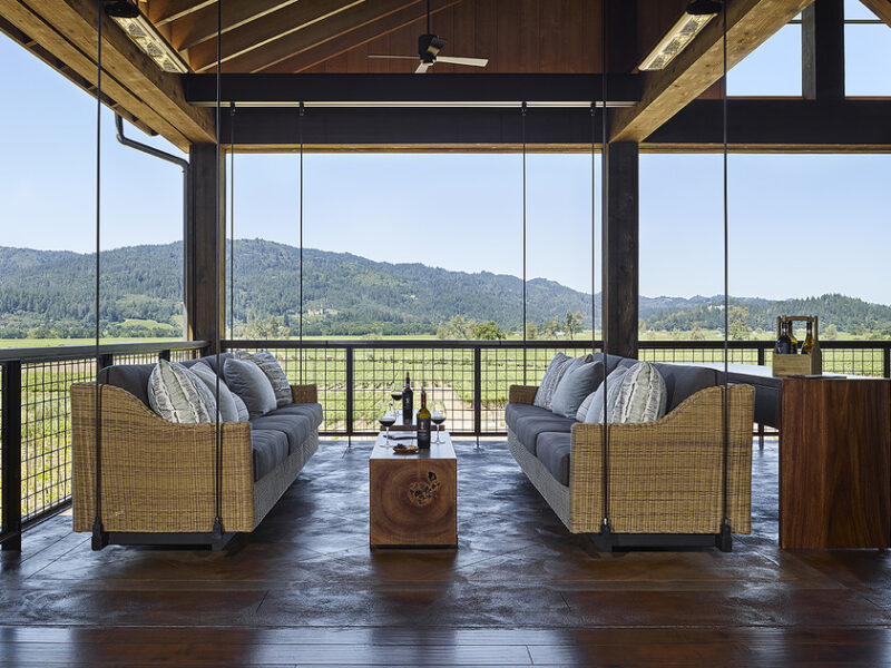 swinging couch with a mountain background in Davis Estates